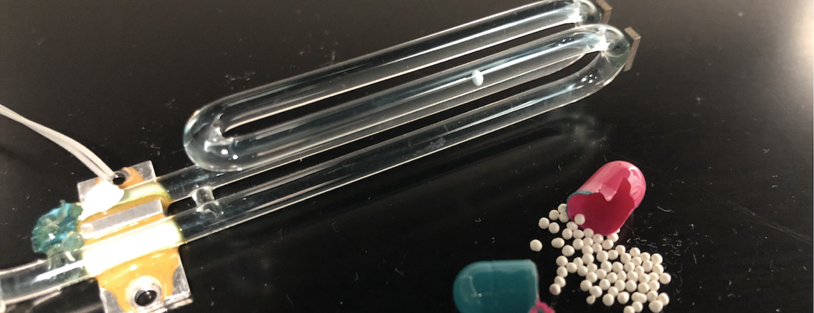 A piece of glass tubing bend like a tuning fork is used to measure dissolution of time release drugs